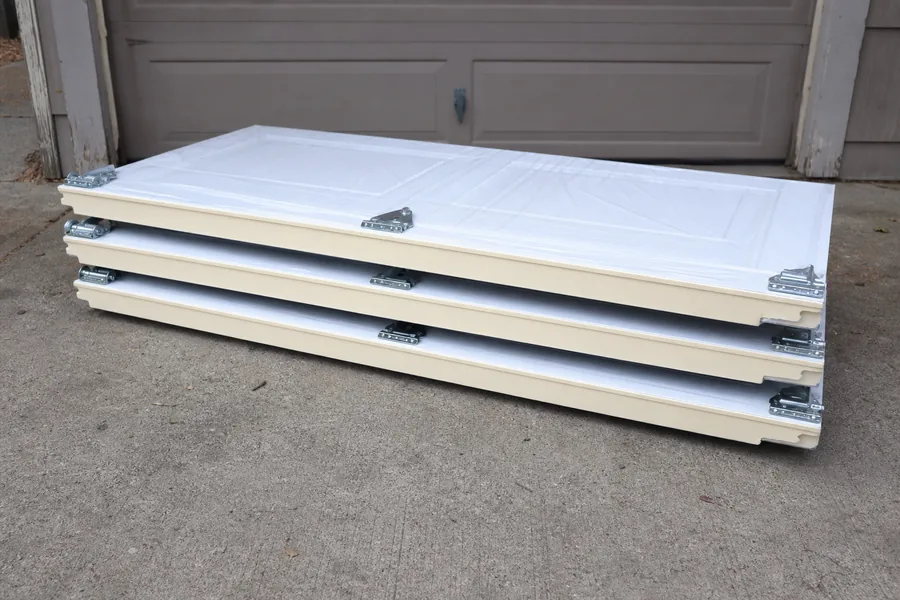New insulated door sections on the driveway in Tulsa, OK